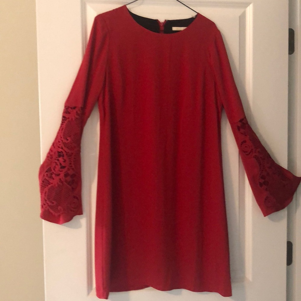 TURN HEADS with this one! Red dress never worn.